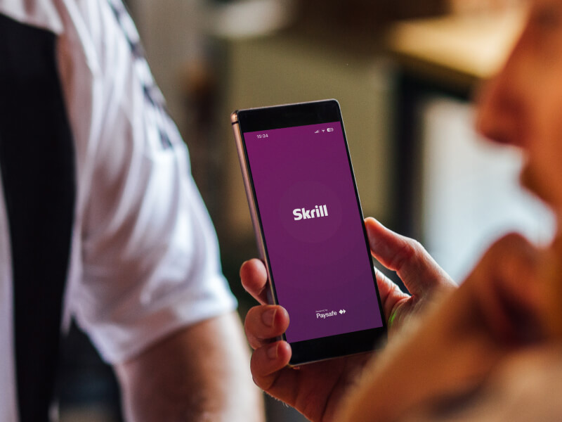 mobile phone open to the Skrill home screen