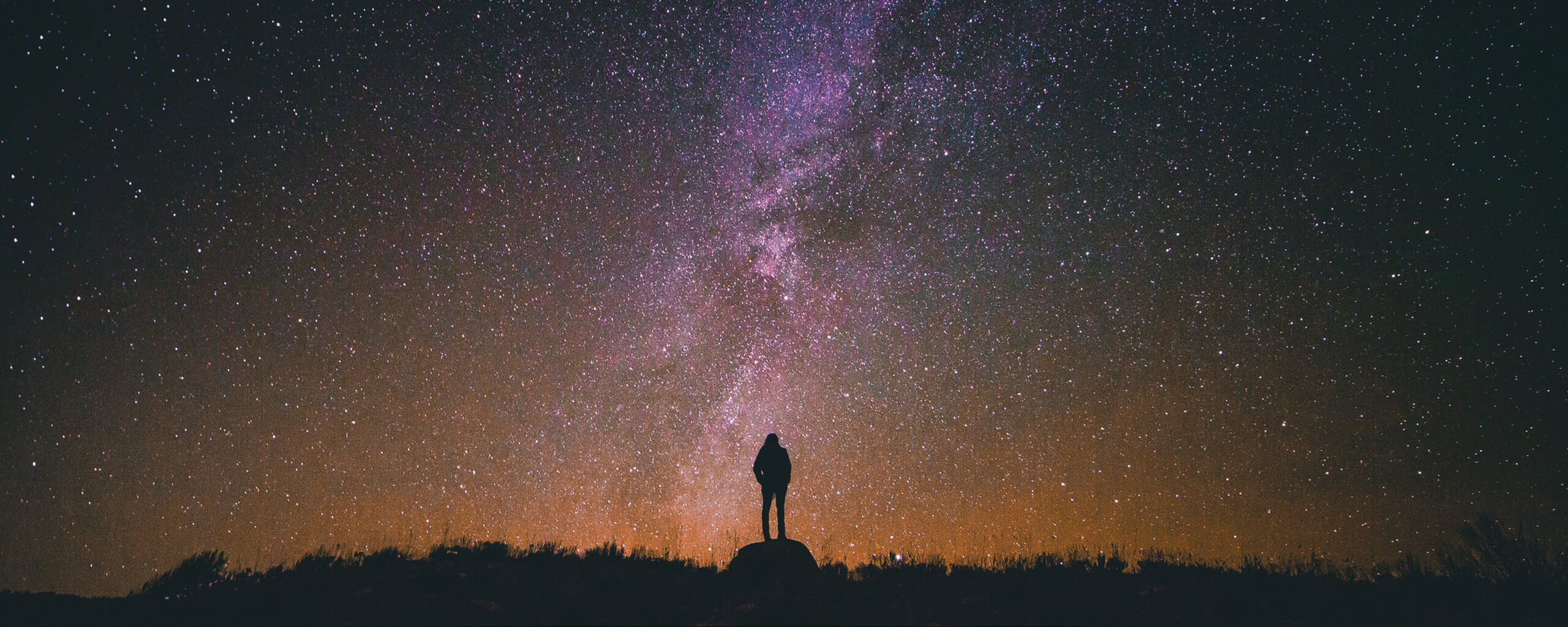 man on a starry night sky background