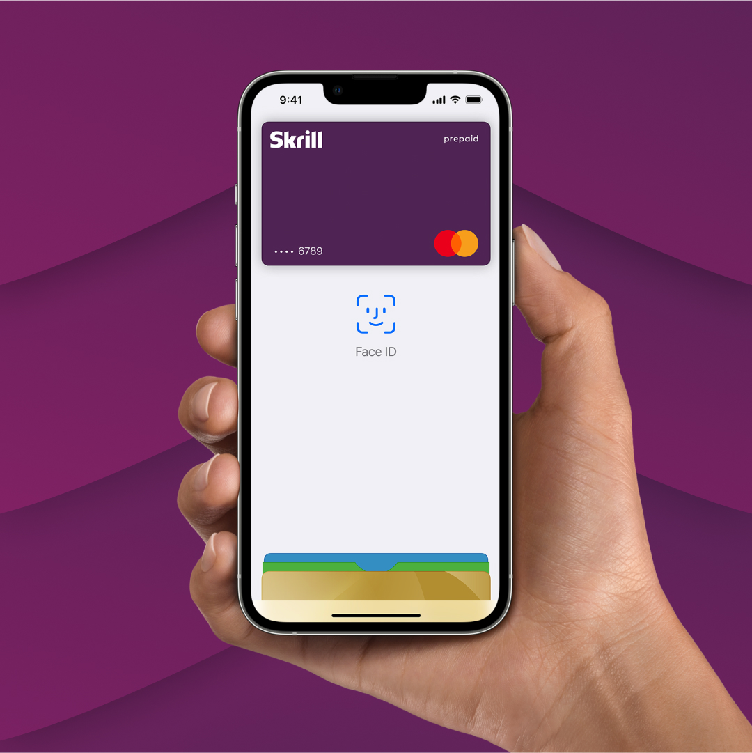 hand holding Apple pay screen with added Skrill card