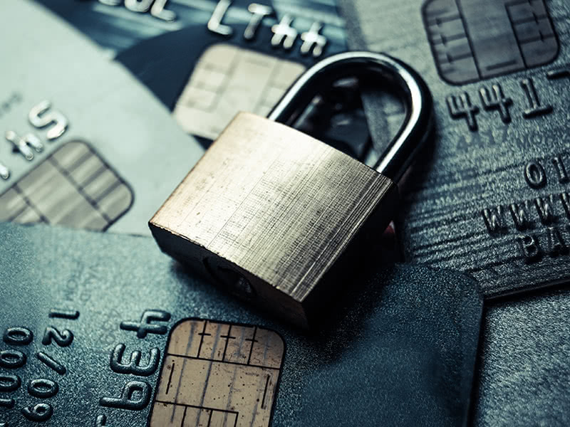 padlock over credit cards